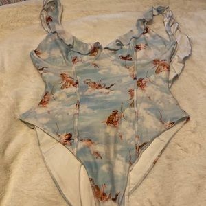 Weworewhat baby angels one piece very sexy one piece. I wore this once.